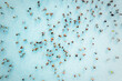 © AmazingAerialAgency - Aerial view of people doing a bath in a huge pool, Sicily, Italy.