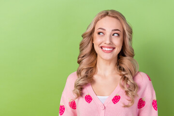 Sticker - Portrait of adorable lady stylish curls look wondered empty space wear pink shirt cardigan isolated green color background