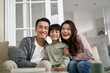 © imtmphoto - young asian family with one kid having a good time at home