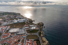 Aerial View Of Peniche Peninsula With High Cliffs Coastline Along The Atlantic Ocean Coastline, Leiria District, Portugal.