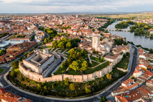 Aerial View Of Zamora Old Town With Fortified Walls, View Of The Main Cathedral And The Castle At Sunset, Spain.