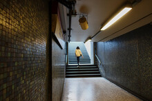 Subway Train Station With Person In A Staircase