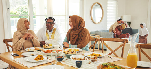 Canvas Print - Food, relax and muslim with big family at table for eid mubarak, Islamic celebration and lunch. Ramadan festival, culture and iftar with people eating at home for fasting, islam and religion holiday