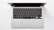 © Charlyvaq/Wirestock Creators - AI generated laptop computer on white background