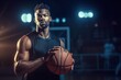 © nuclear_lily - Portrait of afro american male basketball player with a ball over basketball court background.