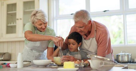 Wall Mural - Grandparents, love and teaching child cooking in a kitchen preparing a meal together in a home while bonding. Food, grandmother and grandfather with kid learning nutrition as care and support