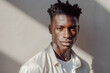 © ADDICTIVE STOCK - Young African american man portrait outdoors. Generative AI.