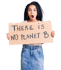 Poster - Cute african american girl holding there is no planet b banner scared and amazed with open mouth for surprise, disbelief face