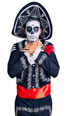 Sticker - Young man wearing day of the dead costume over background shouting and suffocate because painful strangle. health problem. asphyxiate and suicide concept.