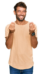 Poster - Handsome young man with beard wearing casual tshirt doing money gesture with hands, asking for salary payment, millionaire business