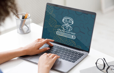 Aufkleber - Cropped woman entrepreneur using online assistant on laptop at office