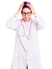 Sticker - Young beautiful woman with pink hair wearing doctor uniform suffering from headache desperate and stressed because pain and migraine. hands on head.