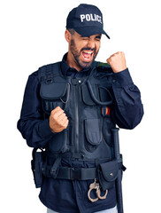 Poster - Young hispanic man wearing police uniform celebrating surprised and amazed for success with arms raised and eyes closed. winner concept.