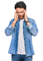 Sticker - Young hispanic man wearing casual clothes with hand on head, headache because stress. suffering migraine.