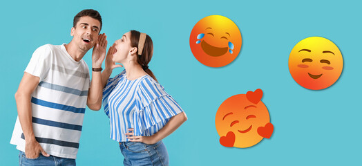 Gossiping young couple and different smiling emoticons on blue background