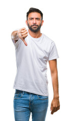 Sticker - Adult hispanic man over isolated background looking unhappy and angry showing rejection and negative with thumbs down gesture. Bad expression.