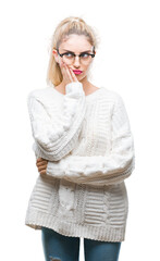 Wall Mural - Young beautiful blonde woman wearing glasses over isolated background thinking looking tired and bored with depression problems with crossed arms.