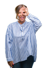 Poster - Middle age senior hispanic woman over isolated background doing ok gesture with hand smiling, eye looking through fingers with happy face.