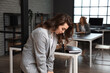 © Pixel-Shot - Young woman having panic attack in office