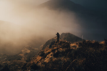 Man hunting for deer in hills