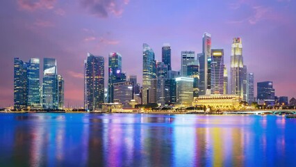 Wall Mural - Singapore cityscape skyline time lapse in the evening at Marina bay area.