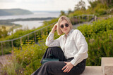 Fototapeta Młodzieżowe - Portrait of the young girl outside. Lifestyle. Gen Z.