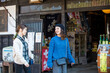 © amanaimages - 秋の宿場町を散策する女性２人