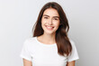 © JuanM - Close up of a young woman smiling and wearing a white t-shirt on a white background. Generative AI