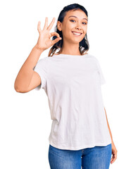 Sticker - Young woman wearing casual clothes smiling positive doing ok sign with hand and fingers. successful expression.