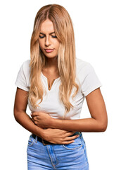 Sticker - Beautiful blonde young woman wearing casual white tshirt with hand on stomach because indigestion, painful illness feeling unwell. ache concept.