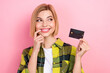 © deagreez - Photo of pretty minded creative lady finger touch lips hold debit card look empty space isolated on pink color background