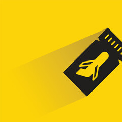 Sticker - airline ticket with shadow on yellow background