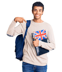 Poster - Young african amercian man wearing student backpack holding binder and uk flag pointing finger to one self smiling happy and proud