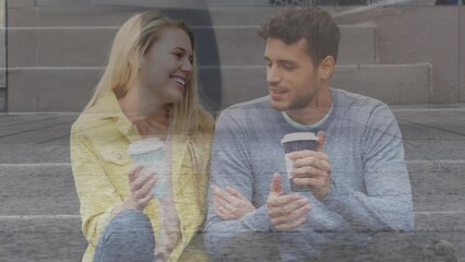 Poster - Animation of caucasian couple with coffee over people walking and cityscape
