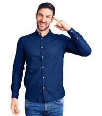 Poster - Young handsome man wearing casual shirt smiling pointing to head with one finger, great idea or thought, good memory