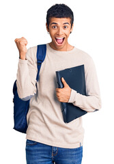 Poster - Young african amercian man wearing student backpack holding binder screaming proud, celebrating victory and success very excited with raised arms