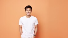 Fictional Young Asian Male Model Wearing A Plain White T-shirt. Isolated On Colored Background. Generative AI Illustration.