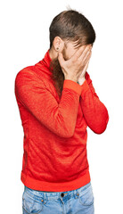 Wall Mural - Redhead man with long beard wearing casual clothes with sad expression covering face with hands while crying. depression concept.