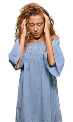 Sticker - Beautiful caucasian teenager girl wearing summer dress with hand on head for pain in head because stress. suffering migraine.