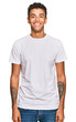 © Krakenimages.com - Young handsome african american man wearing casual white tshirt with a happy and cool smile on face. lucky person.