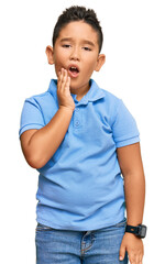 Poster - Little boy hispanic kid wearing casual clothes touching mouth with hand with painful expression because of toothache or dental illness on teeth. dentist