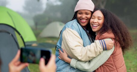 Canvas Print - Women friends, photographer and phone at camp with hug, care and memory with smile for post on social media. People, profile picture and happy for camping, adventure and holiday in forrest together