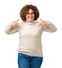 Poster - Beautiful middle ager senior woman wearing turtleneck sweater and glasses over isolated background looking confident with smile on face, pointing oneself with fingers proud and happy.