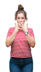 Sticker - Beautiful brunette curly hair young girl wearing casual look over isolated background shocked covering mouth with hands for mistake. Secret concept.