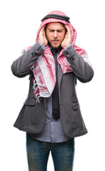 Sticker - Young handsome arabian man with long hair wearing keffiyeh over isolated background with hand on head for pain in head because stress. Suffering migraine.