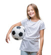 © Krakenimages.com - Young beautiful girl holding soccer football ball over isolated background with a happy face standing and smiling with a confident smile showing teeth