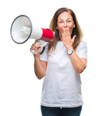 Poster - Middle age hispanic woman yelling through megaphone over isolated background cover mouth with hand shocked with shame for mistake, expression of fear, scared in silence, secret concept