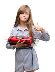 Sticker - Young blonde child holding dynamite bomb happy with big smile doing ok sign, thumb up with fingers, excellent sign