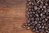 Fototapeta Kuchnia - coffee Beans on wood background