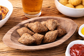 Wall Mural - Traditional arabic fried tiny kibbeh. Typical brazilian snack